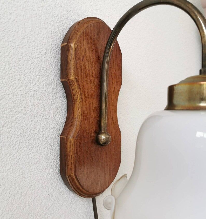Vintage wall lamp with 70s glass cap