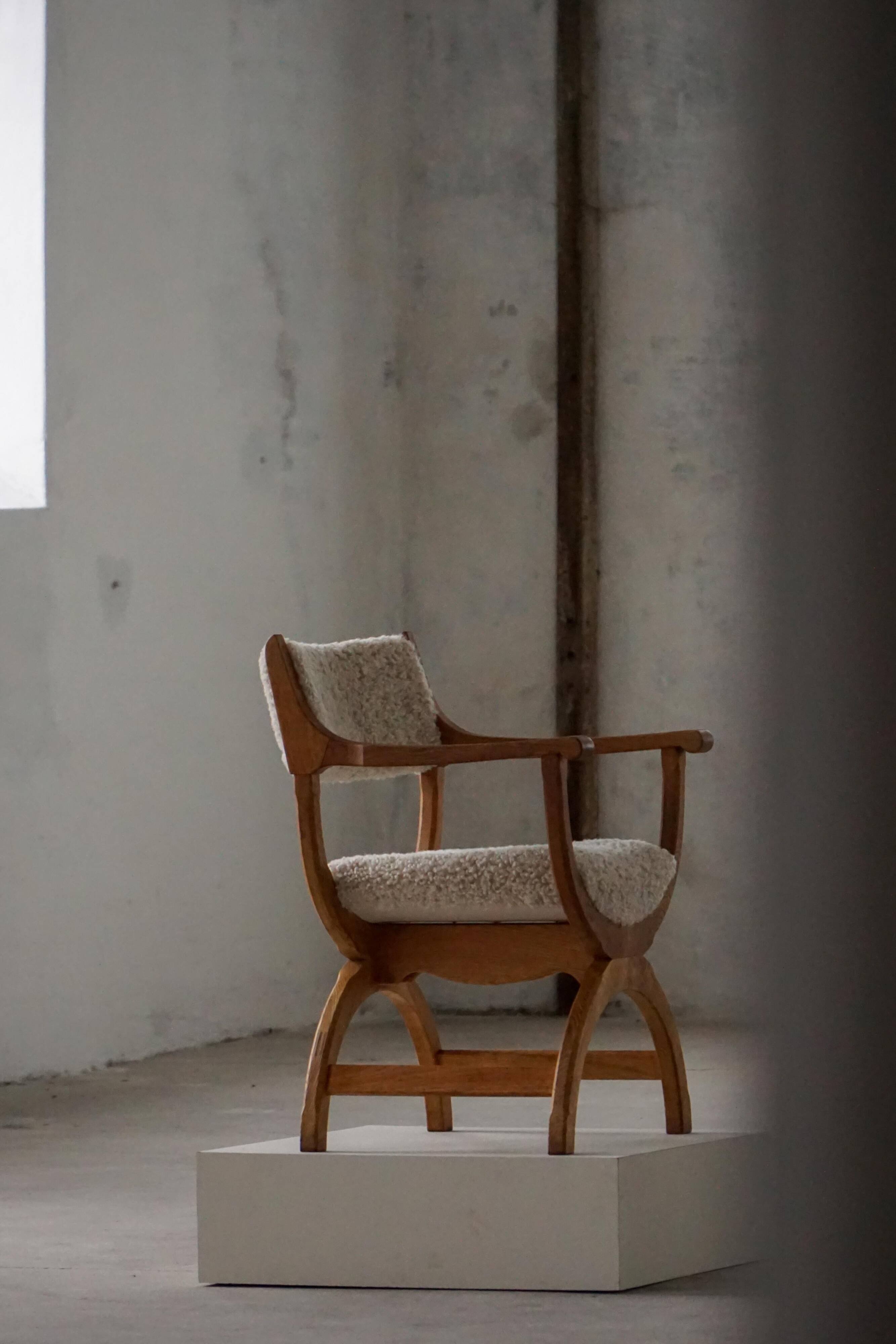 Henning Kjærnulf, Oak and lambswool armchair, "Kurul" model, Mid-century, 1960s