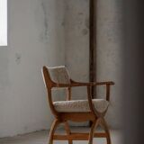 Henning Kjærnulf, Oak and lambswool armchair, "Kurul" model, Mid-century, 1960s