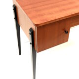 Vintage elegant desk with black legs made in the 60s