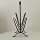 Brutalist wrought iron magazine rack from the 1960s.
