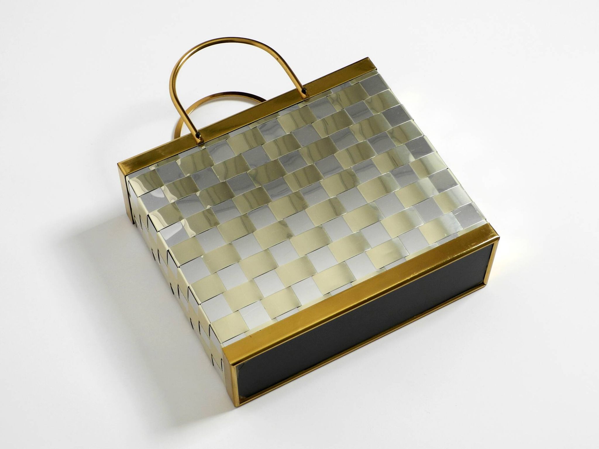 Stunning 1980s brass magazine rack in Hollywood Regency design