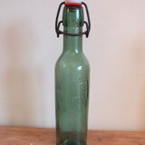 Ancienne bouteille de bière Roulleau à Saint Lô (Manche)