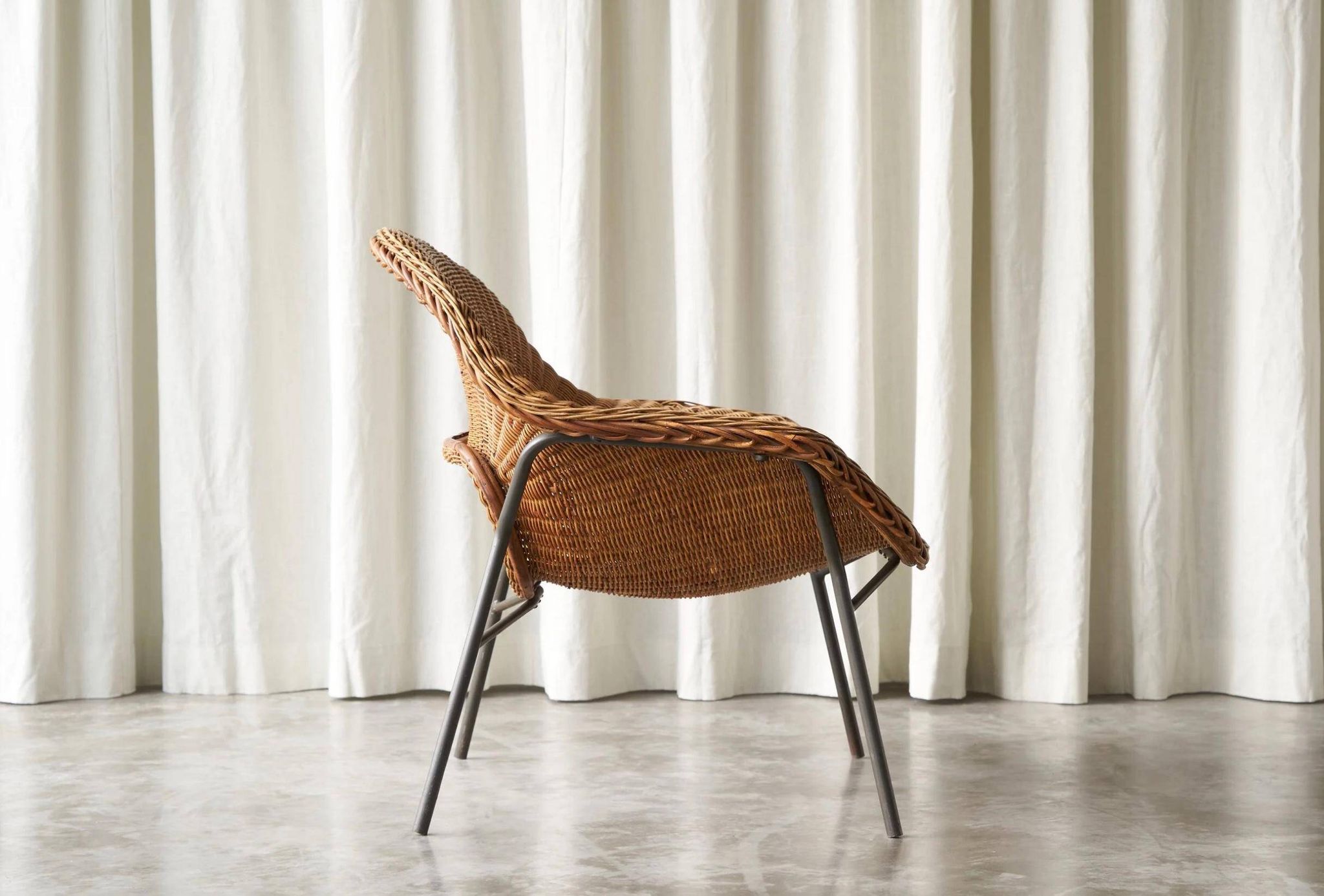 Sculptural lounge chair in rattan and metal, 1960s