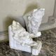 Pair of white statuary marble consoles, with faun heads