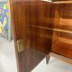 Antique art deco sideboard from the 1930s with veneered wood and bronze insert