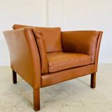 Fauteuil lounge scandinave vintage en cuir cognac, style milieu du siècle