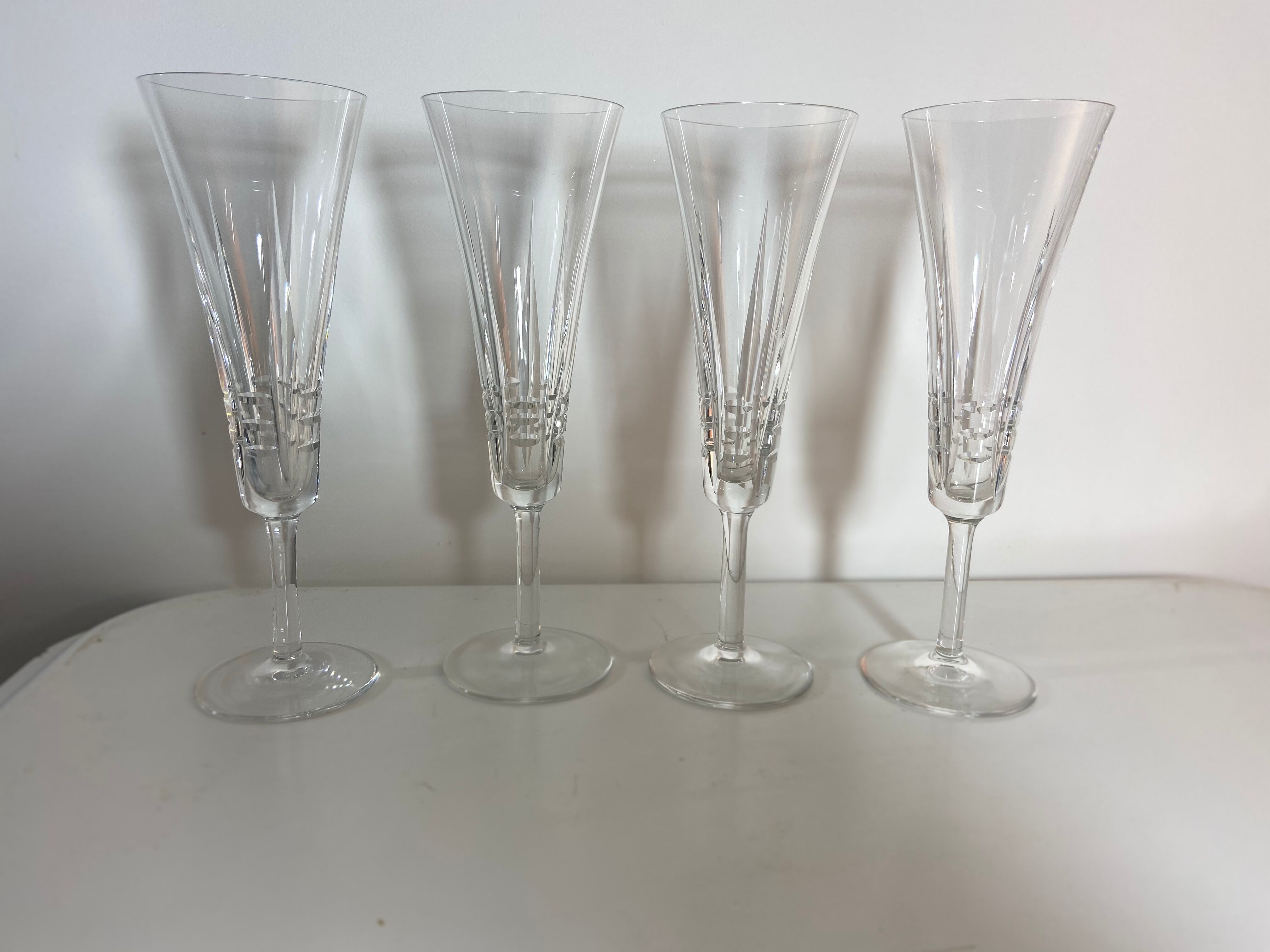 Series of 4 vintage crystal champagne flutes