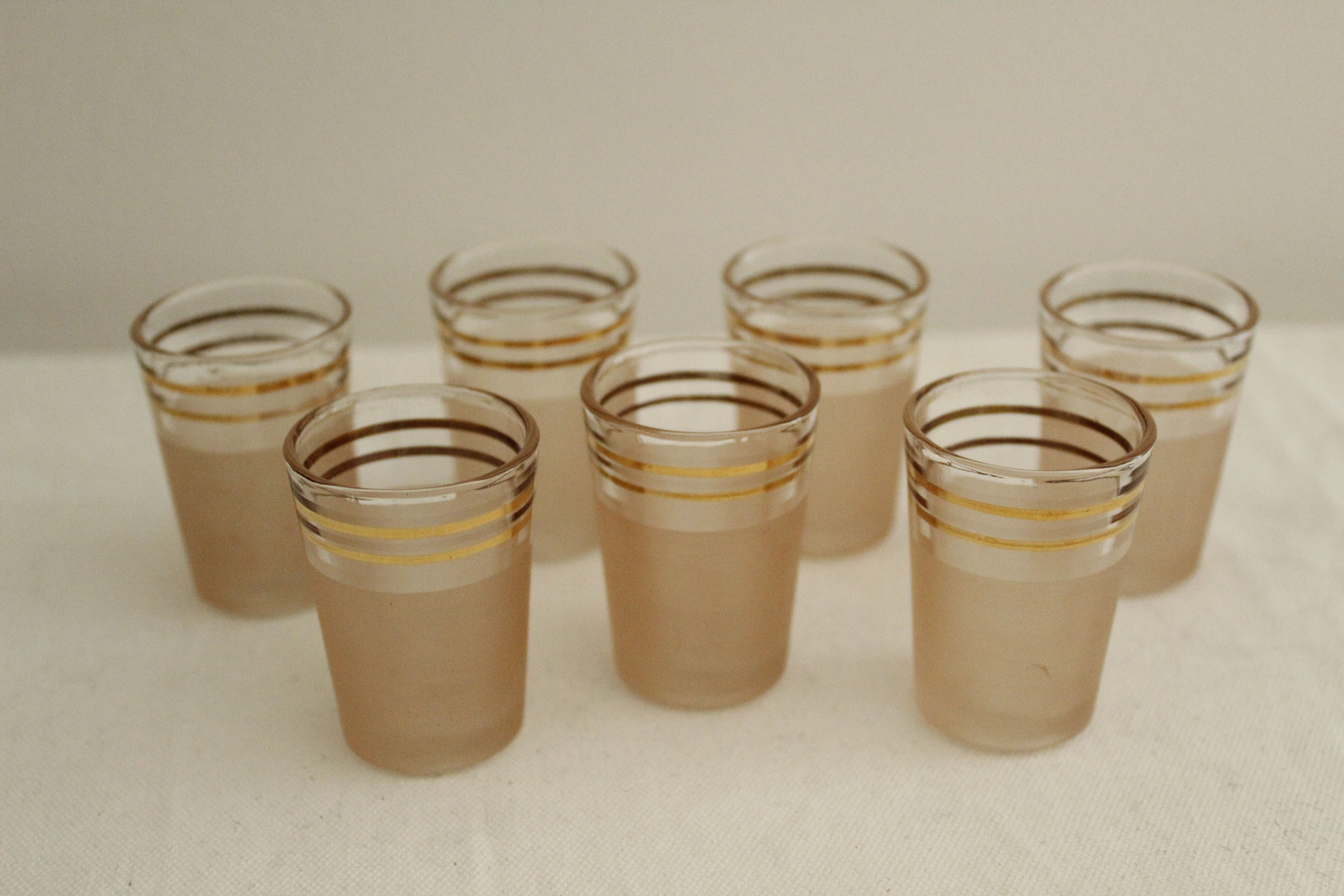 7 pink and gold vintage glass liquor glasses