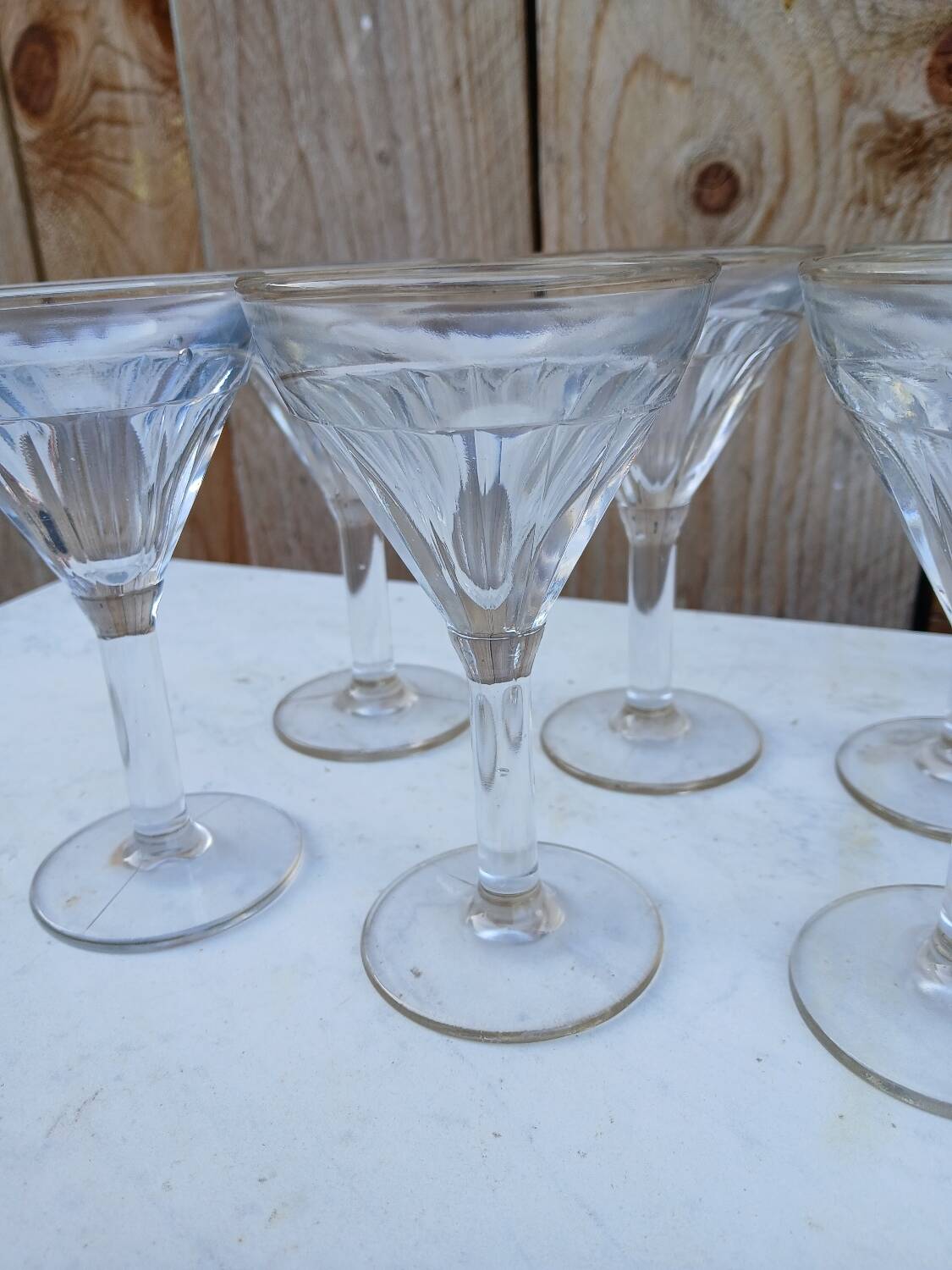 Set of 8 very thick antique stemmed glasses.