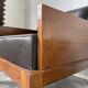 Modernist armchair in exotic wood and leather