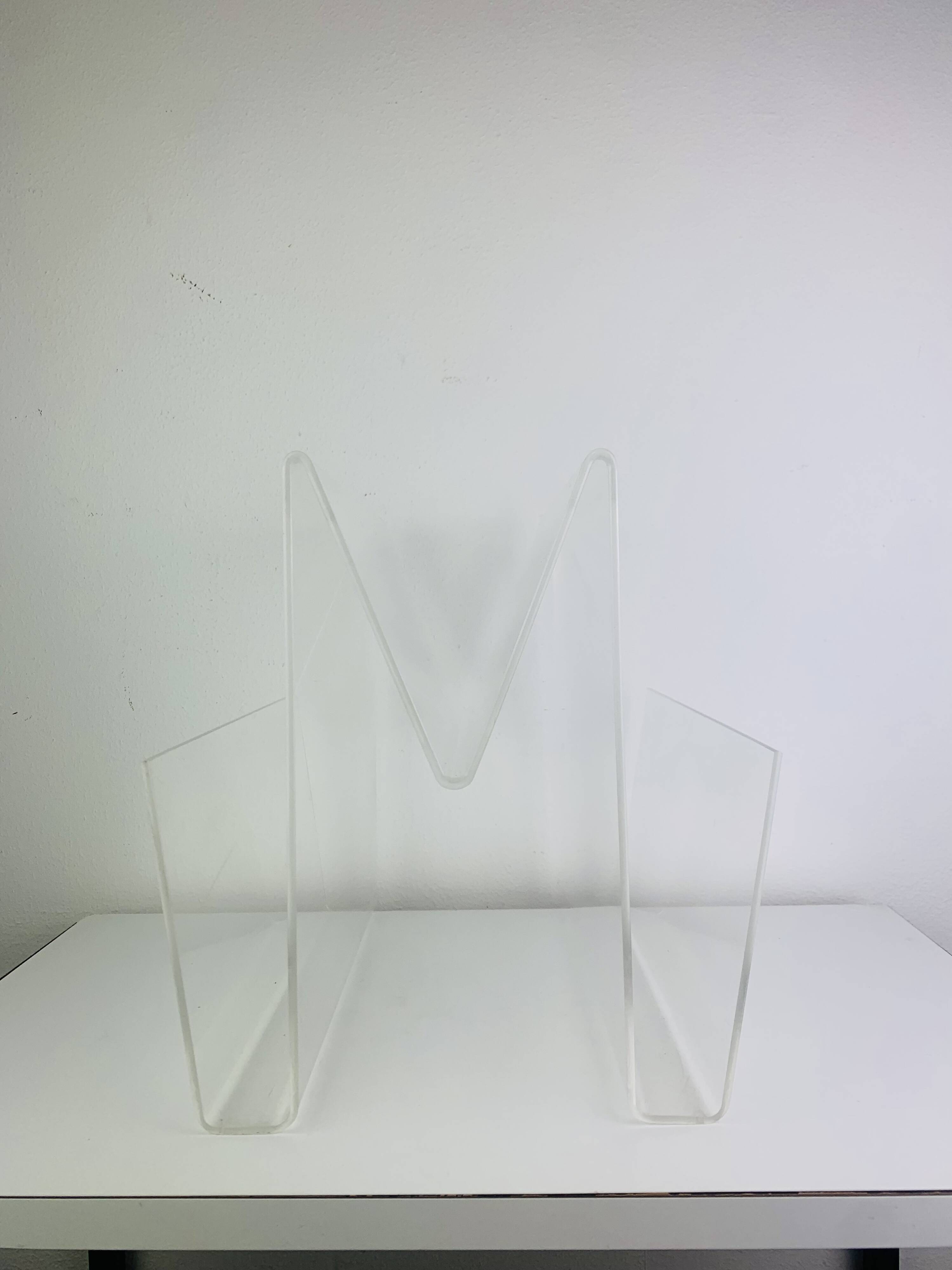 Acrylic magazine rack from the 70s.