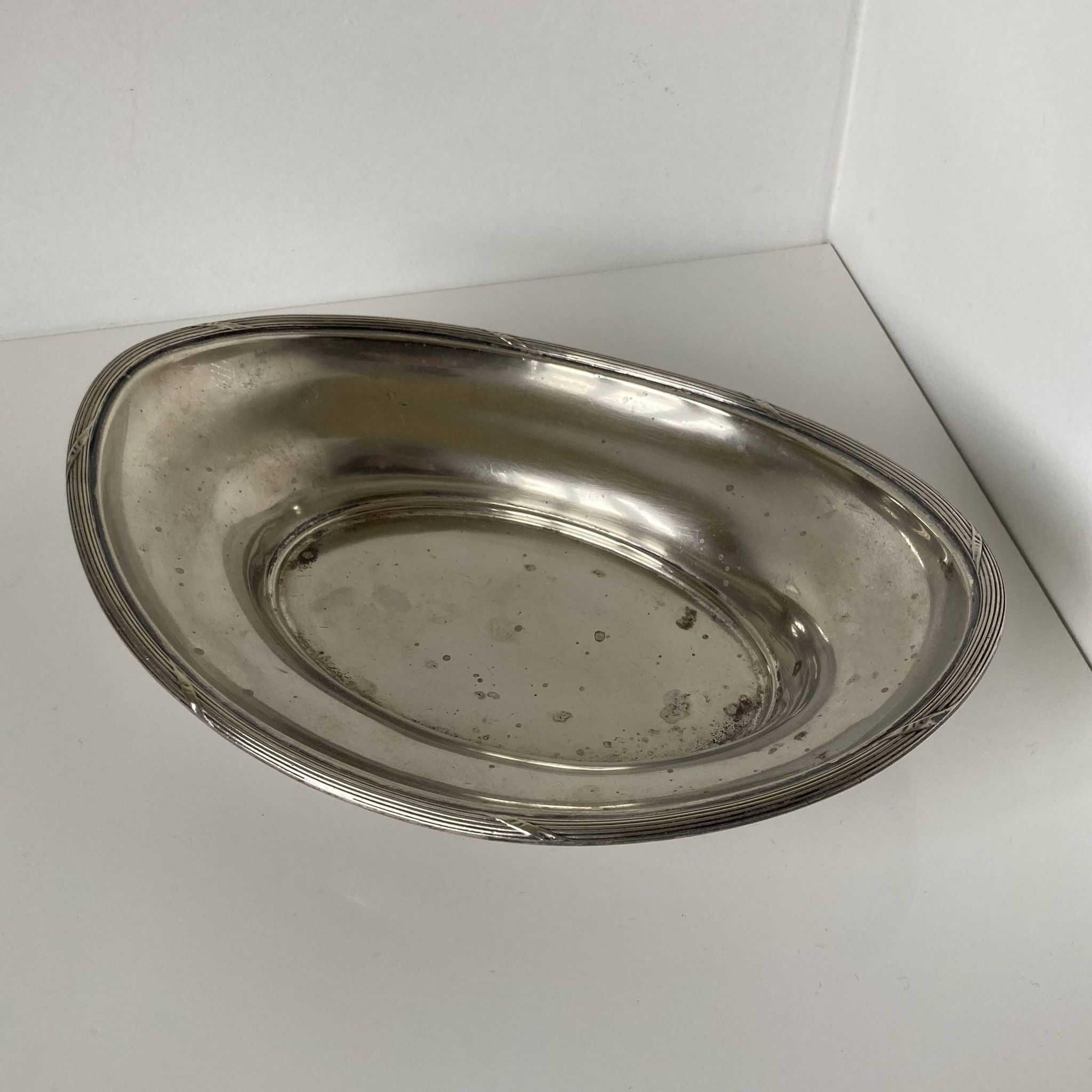 Oval silver-plated tray in the Louis XVI style by Mappin & Webb, London.