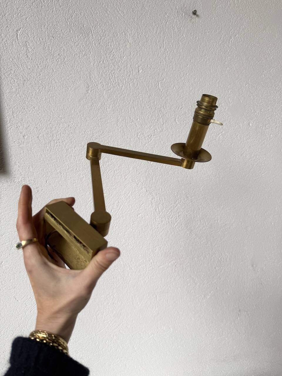 Pair of brass wall lights with articulated arms from the 70s