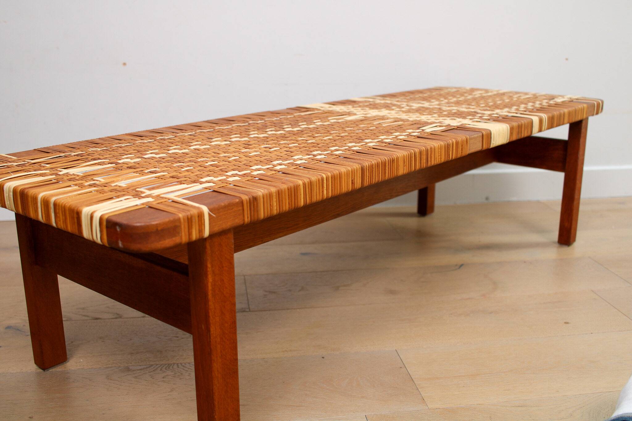 A vintage mid-century Danish Borge Mogensen 5272 rattan coffee table/bench