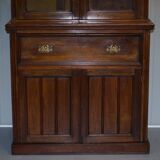 Light wood library with a secretary and leather surface.