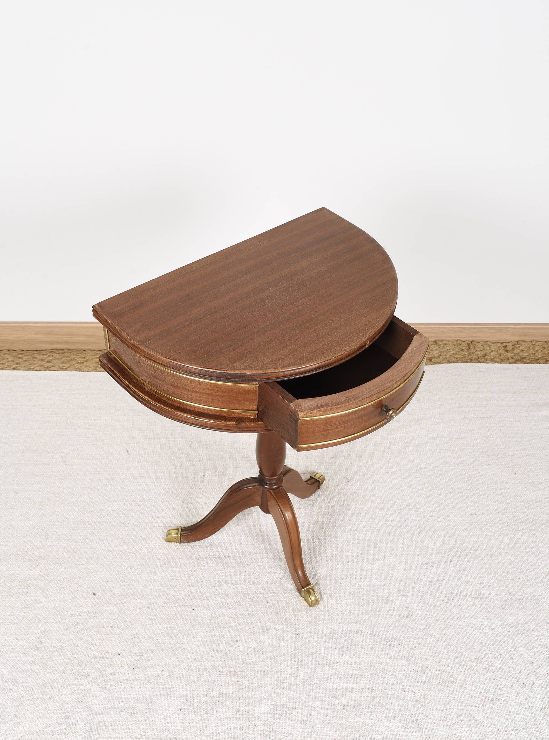 Pedestal table or small side table with drawer.