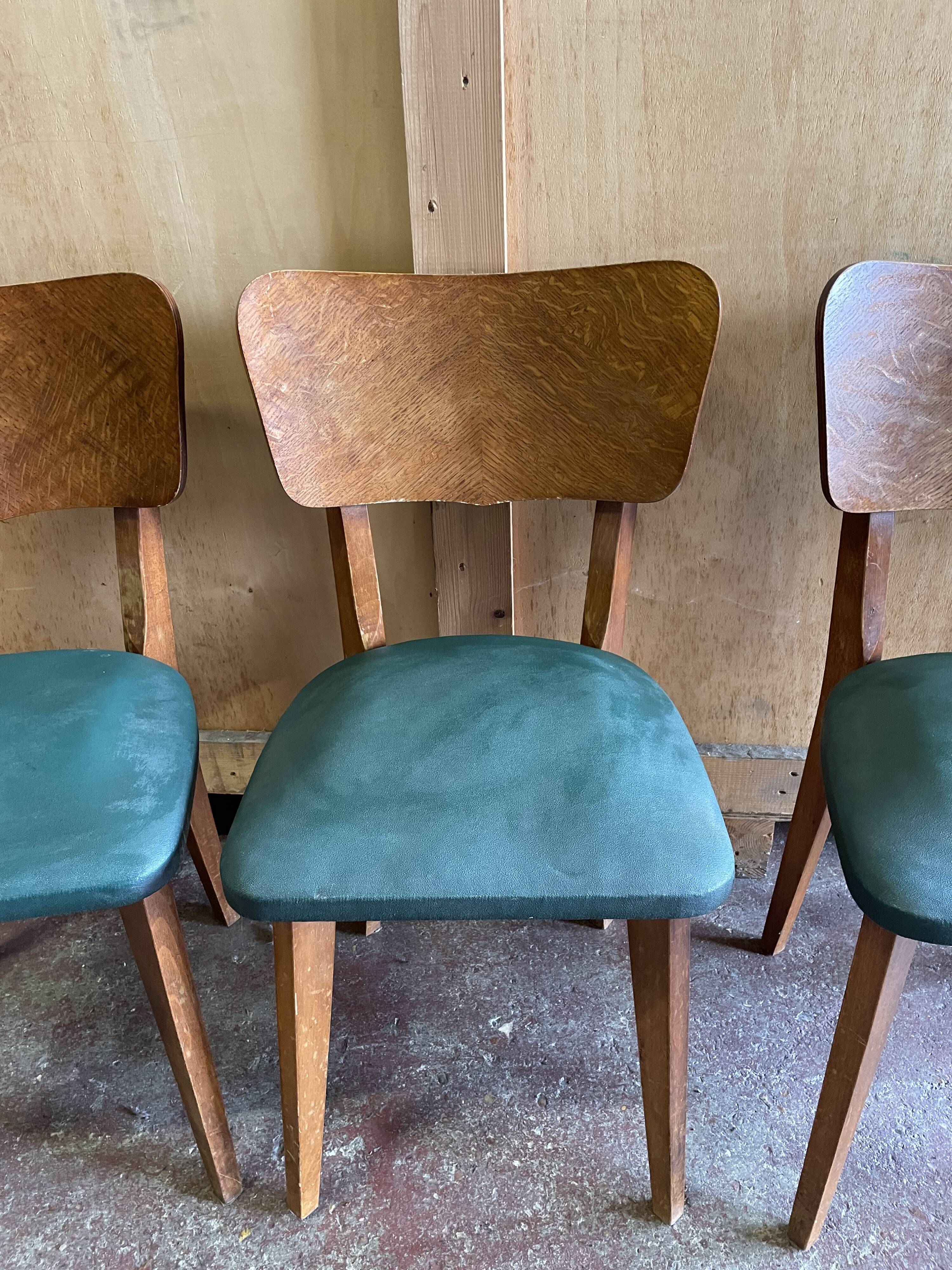 Ensemble de 4 chaises estampillées elf