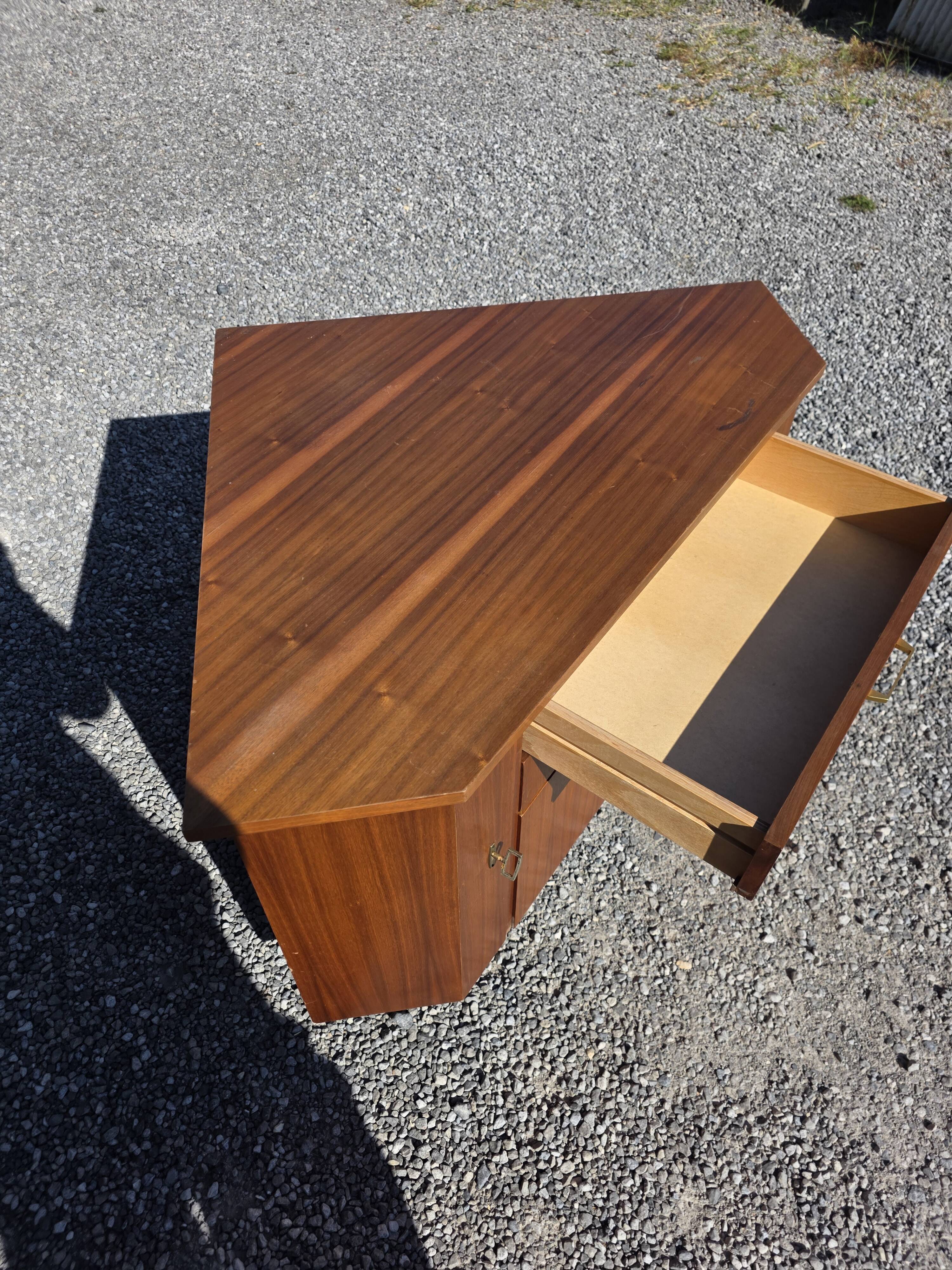 Scandinavian corner unit in teak from the 1960s.