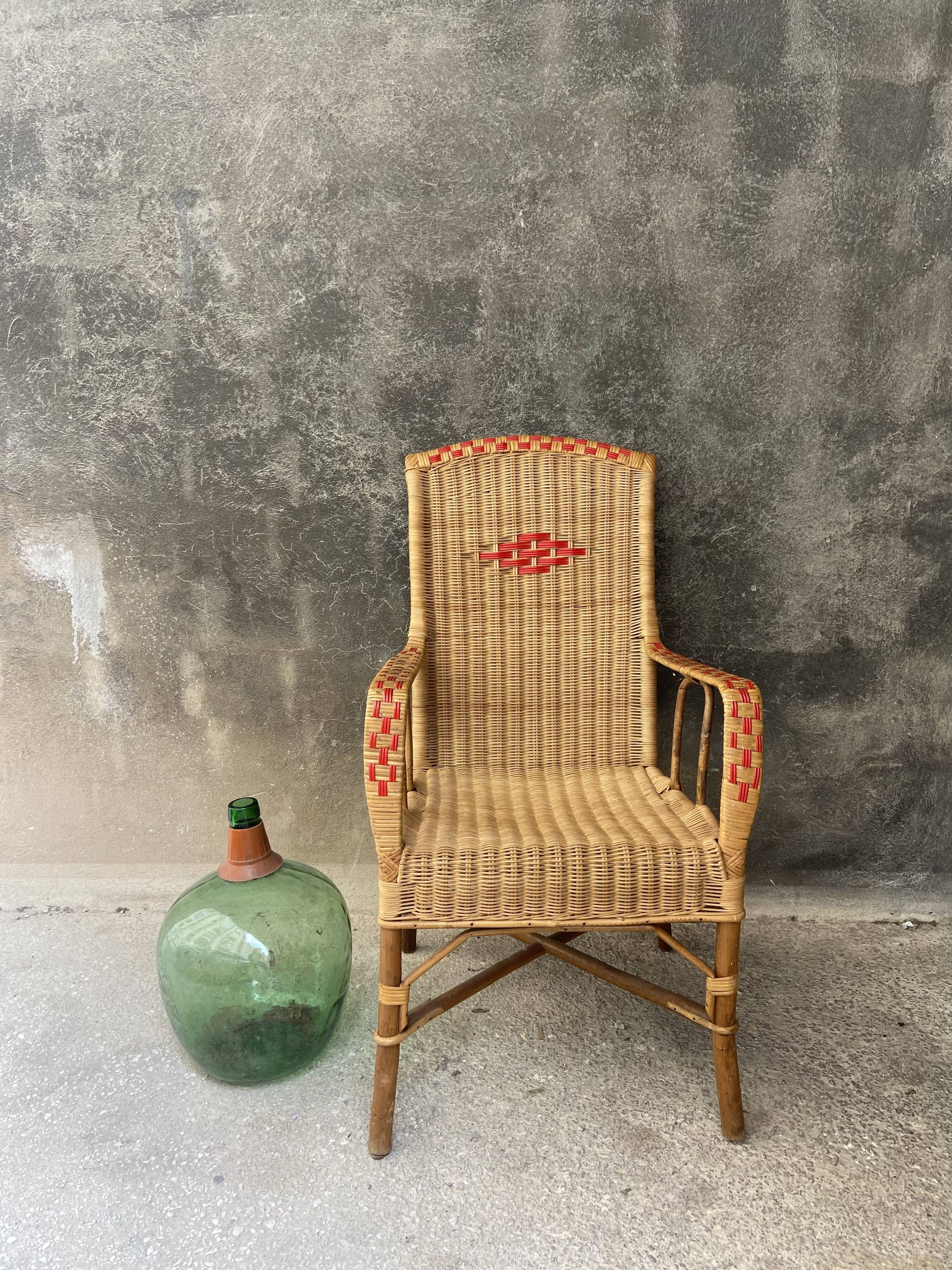 Vintage braided rattan armchair