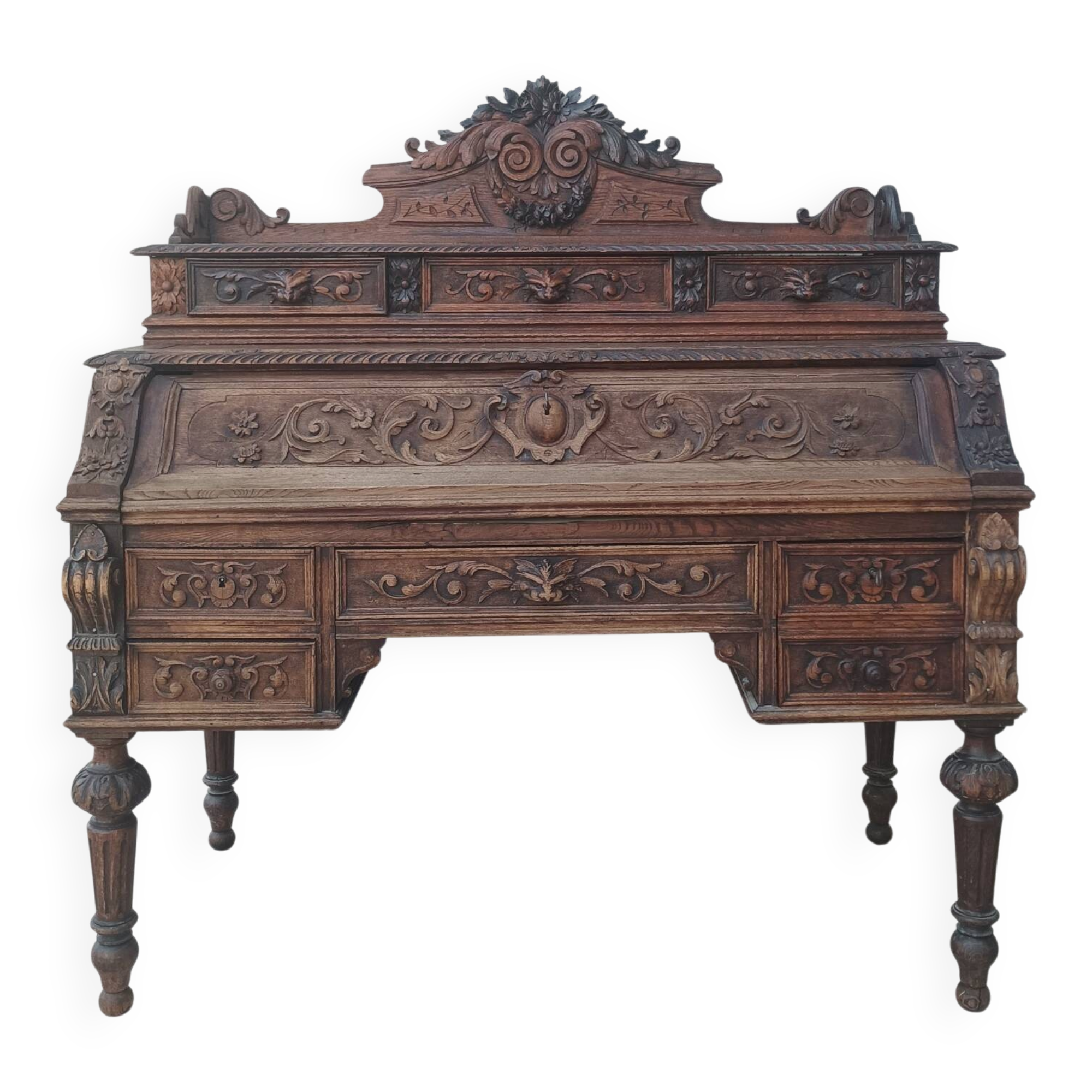 Louis XIII cylinder desk in carved oak, 19th century.