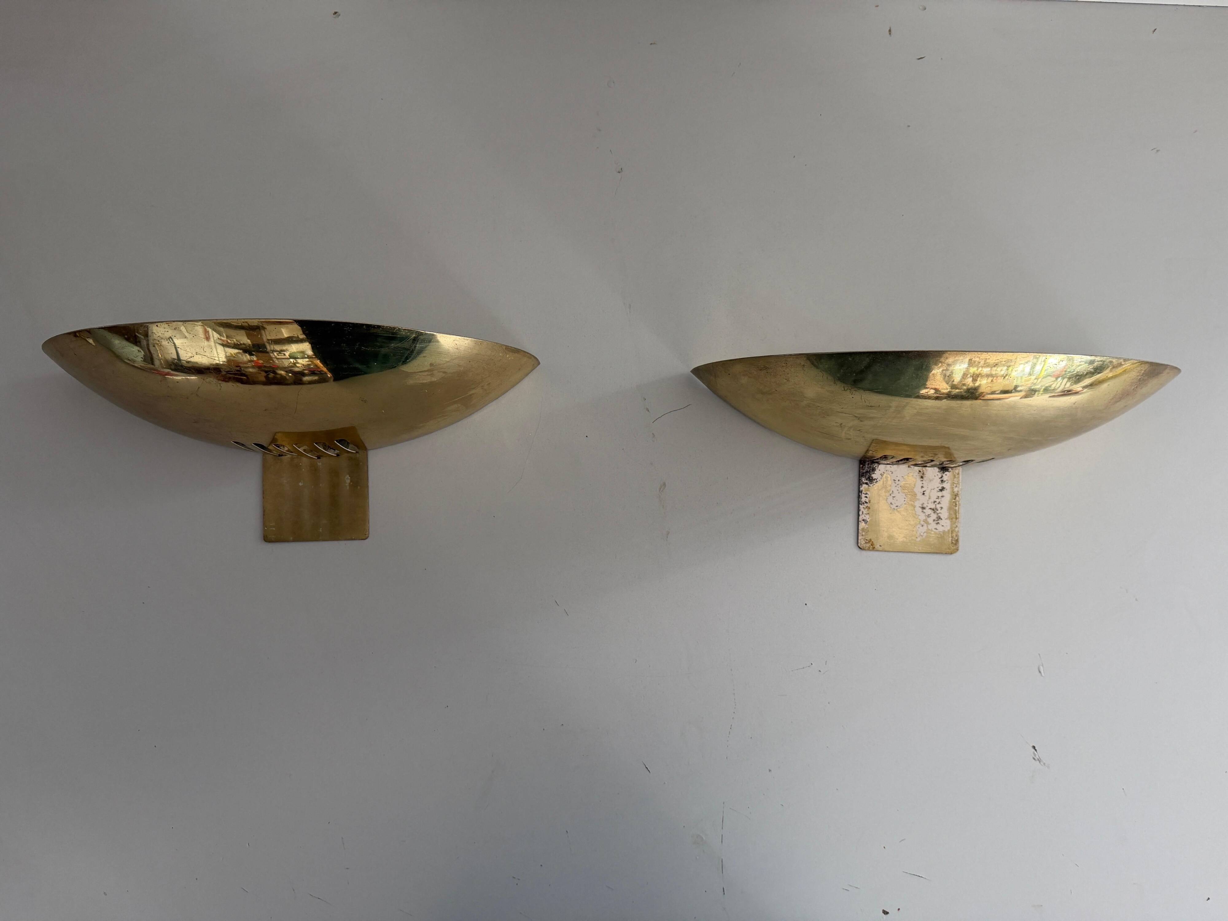 Pair of brass wall sconces from the mid-century by SCE, 1960s, France.