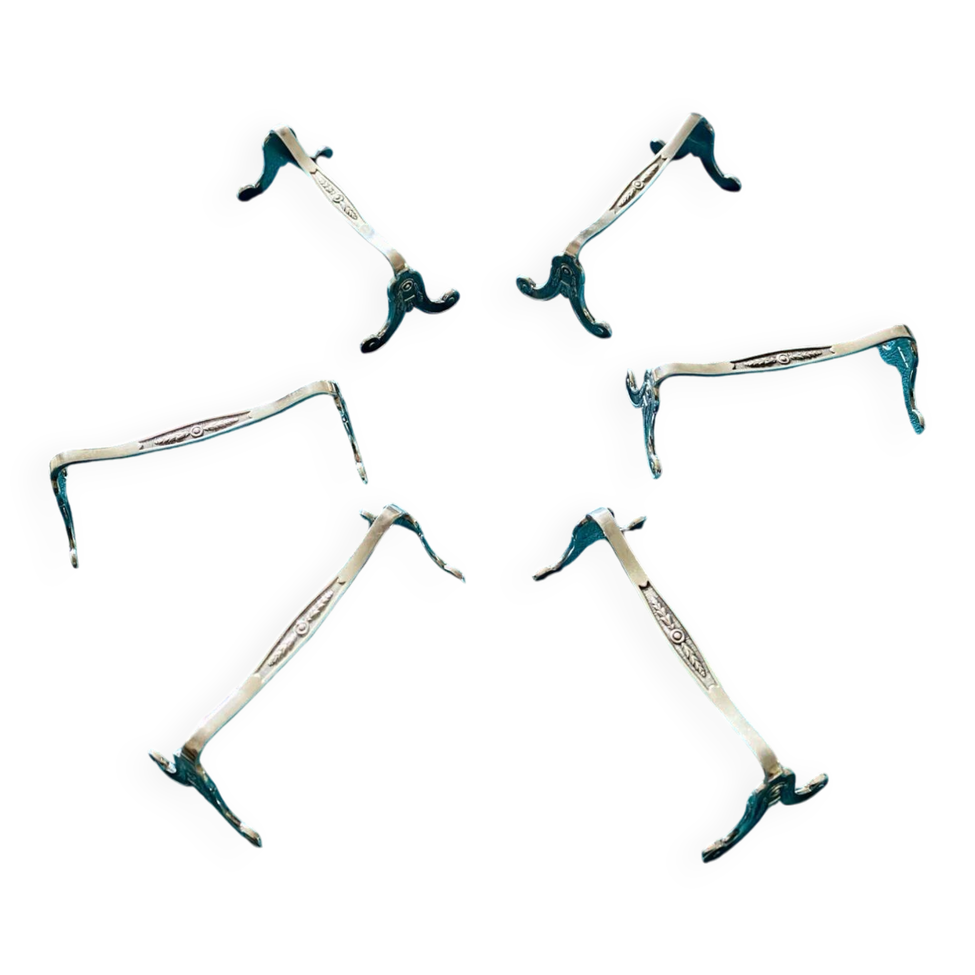 6 Christofle silver-plated metal knife rests