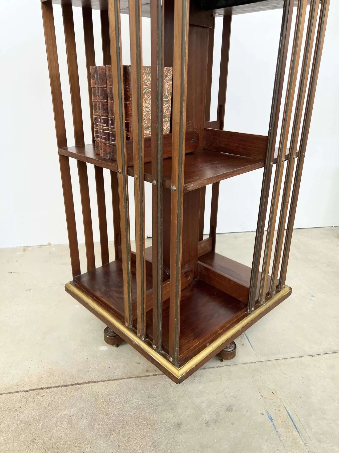 Rotating mahogany and brass library — G. Borgeaud, circa 1900