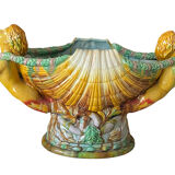Old pot large slurry head bow of boat planter shell scallops