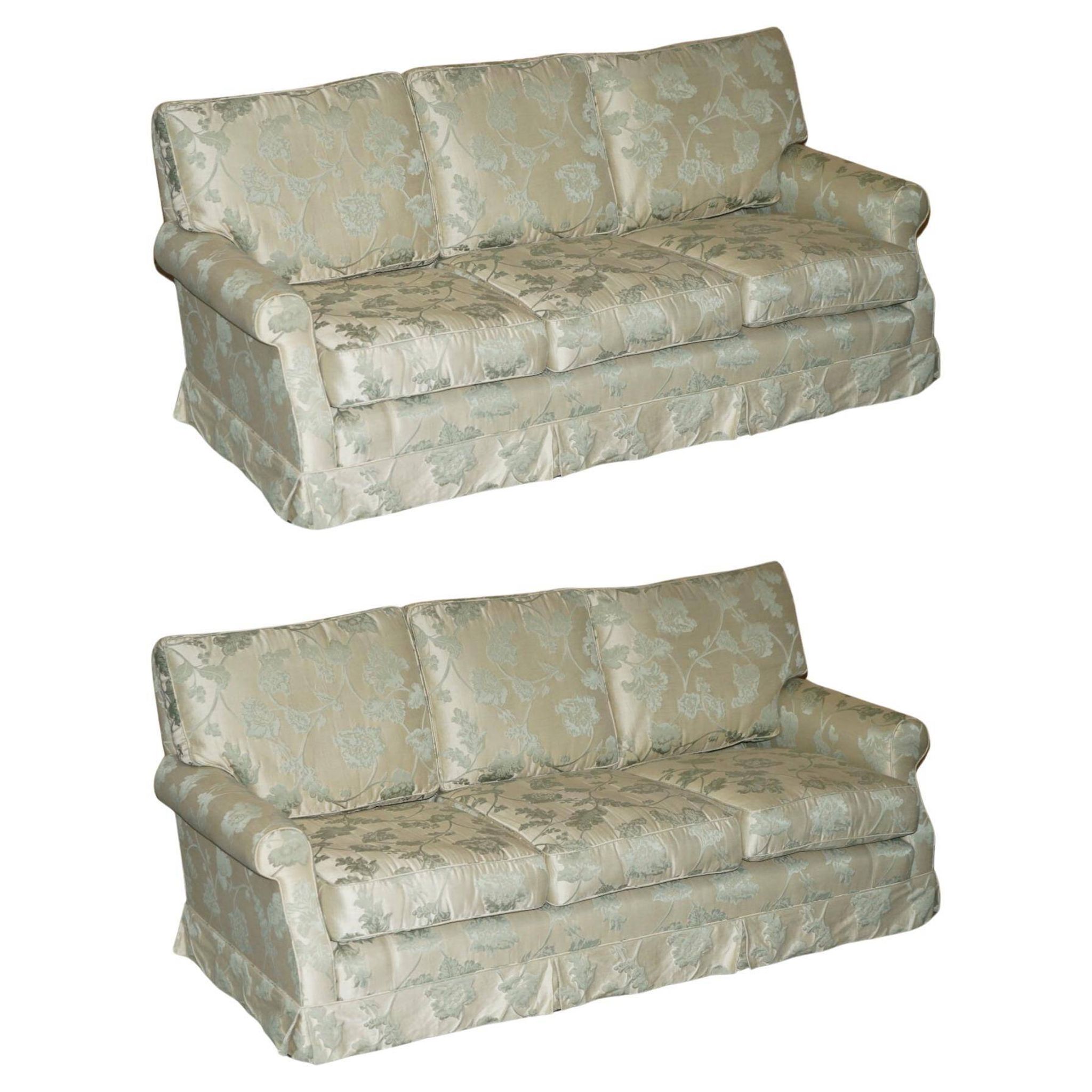 Pair of Howard & Son's style sofas in floral patterned silk blend.