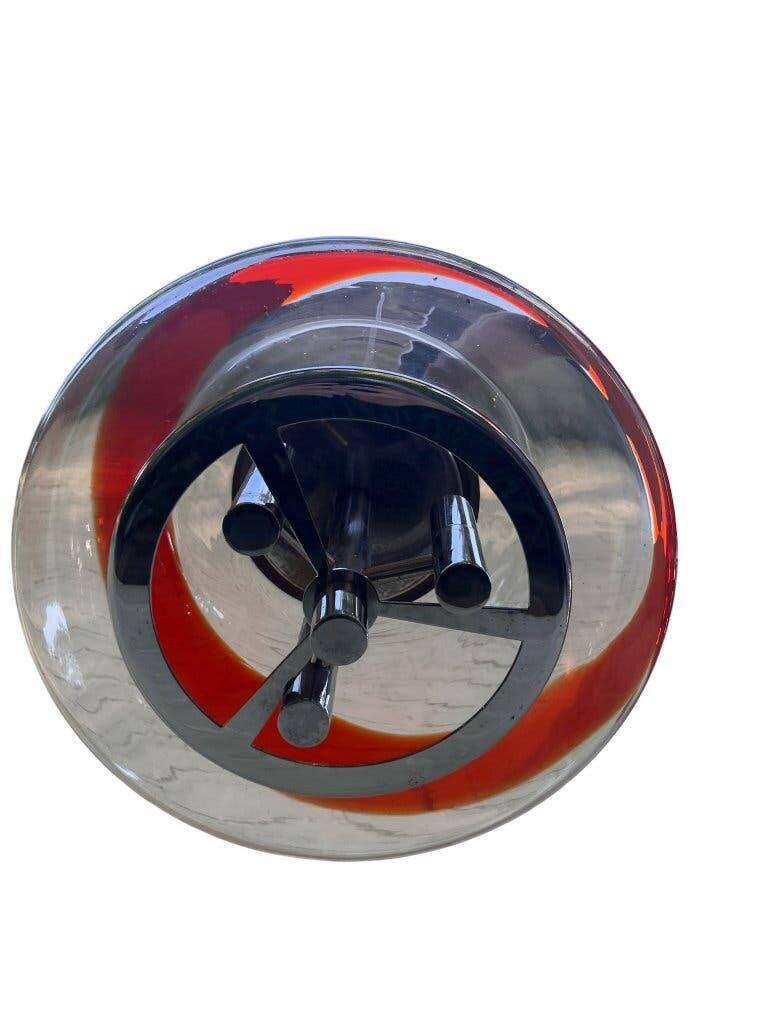 Vintage Murano glass pendant light with orange accent.