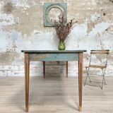Vintage farm table with spindle legs.