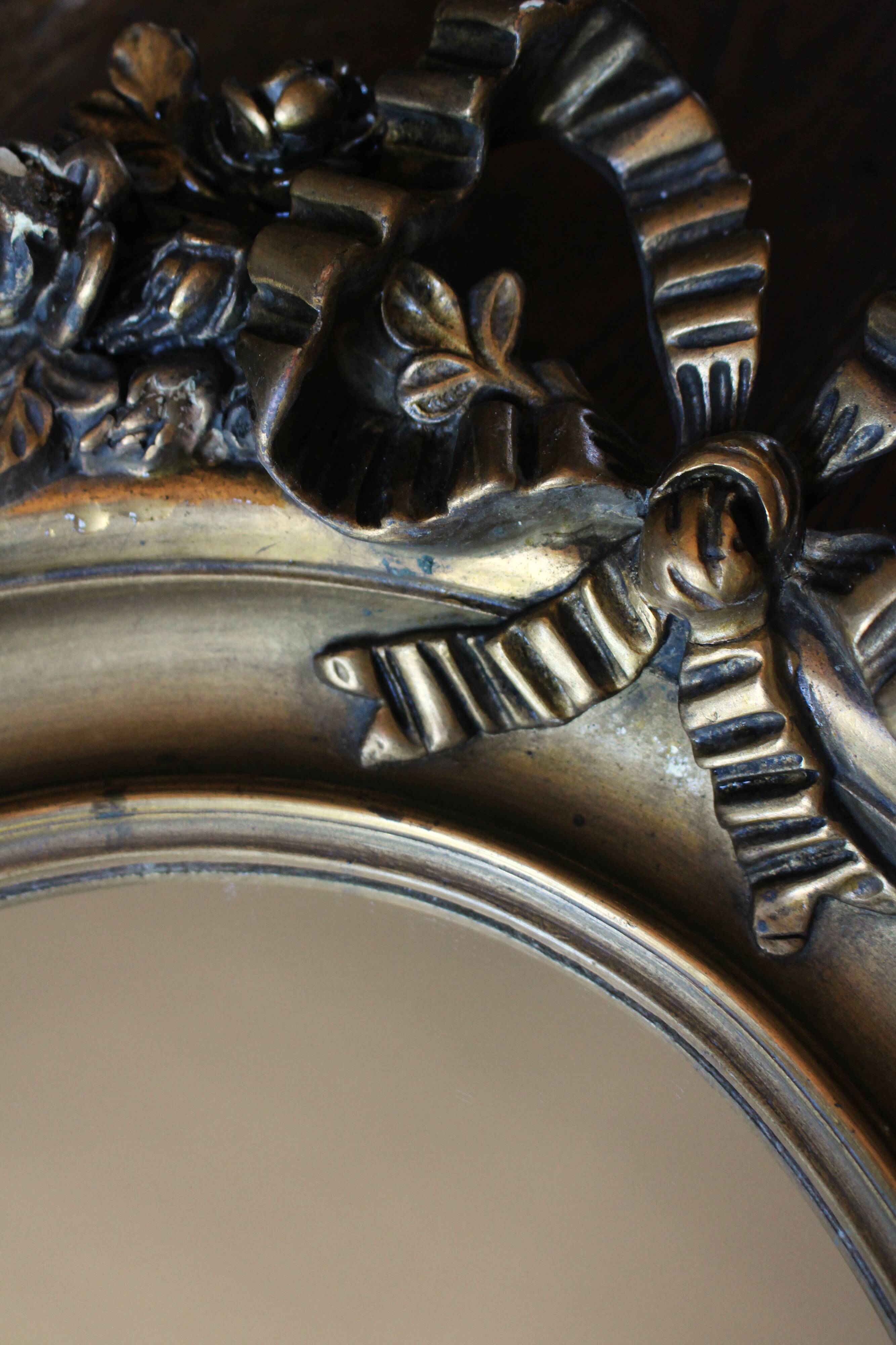Golden Oval Mirror with Bow and Roses Decor