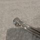 Small silver-plated sugar tongs by Christofle Marly, 11.3 cm