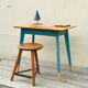 Blue compass foot table
