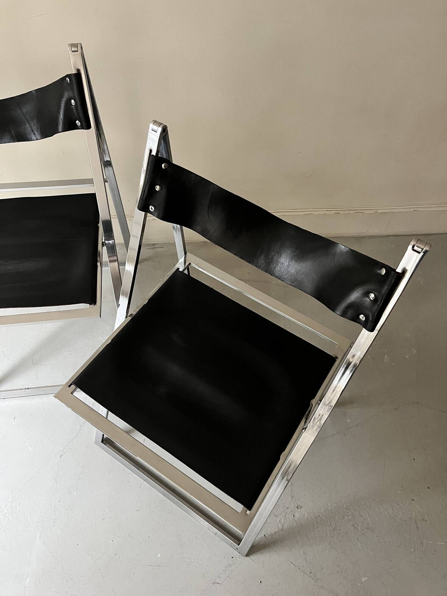 Set of 2 folding chairs in leather and chrome model Elios by Fontini & Geraci, Italy 1970