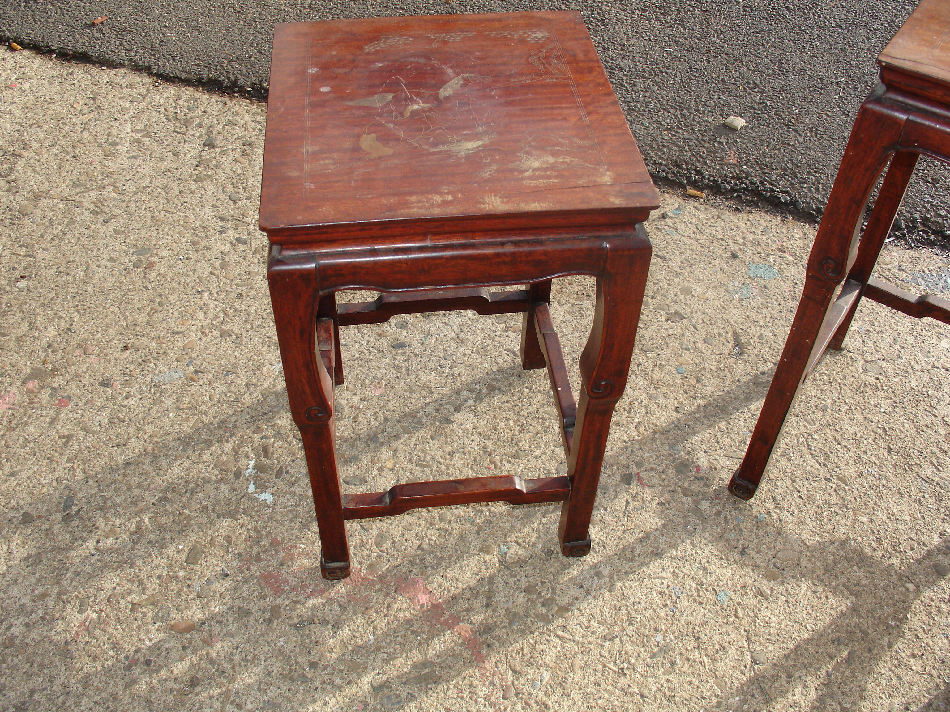 Nesting tables in ironwood with engraved decoration and gold highlights