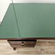 Art Deco executive desk in exotic wood, glass, and brass.