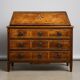 Commode scribanne from the Louis XVI period in walnut burl with marquetry decoration.