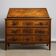 Commode scribanne from the Louis XVI period in walnut burl with marquetry decoration.