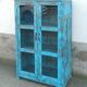 Glass cabinet in old blue wood