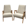 pair of 60s retaped armchairs