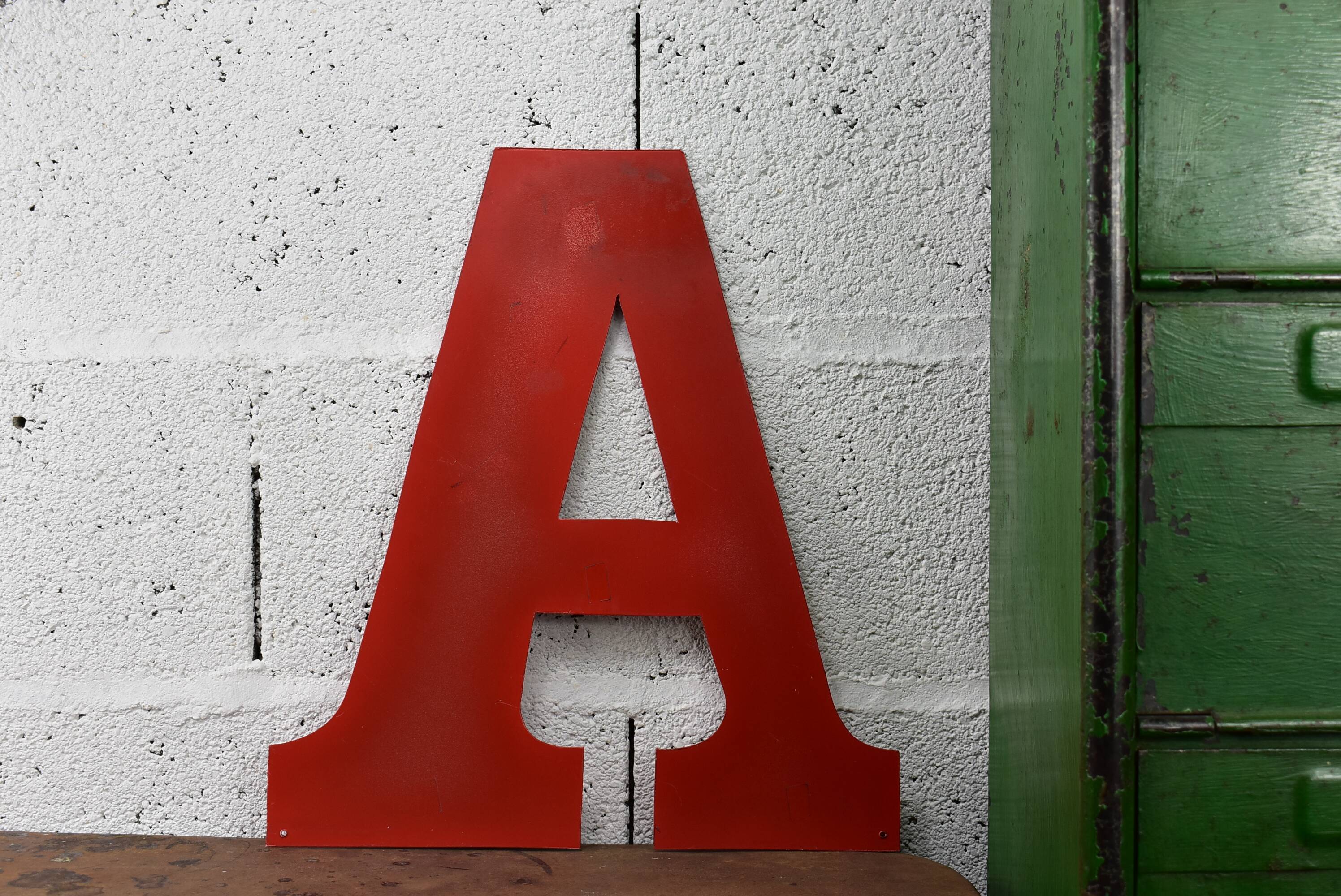 Industrial letter "A" in red metal