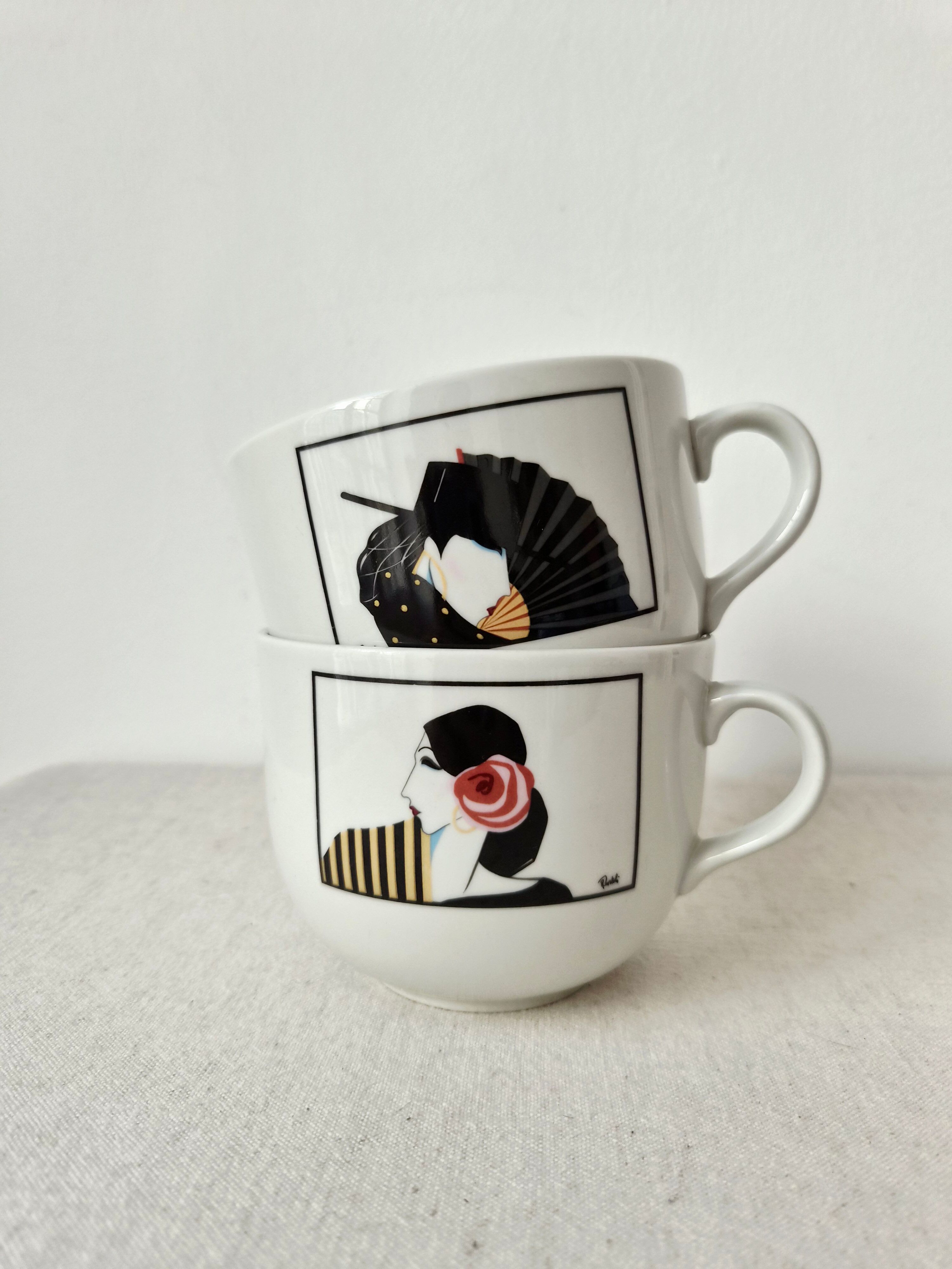 Set of 2 large Art Deco porcelain mugs by Roberto Tortoli.