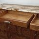 Low sideboard from the beginning of the twentieth century in walnut.