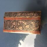 Old box in chiseled and carved brass