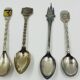 Set of 7 Heraldic Souvenir Spoons from Cities