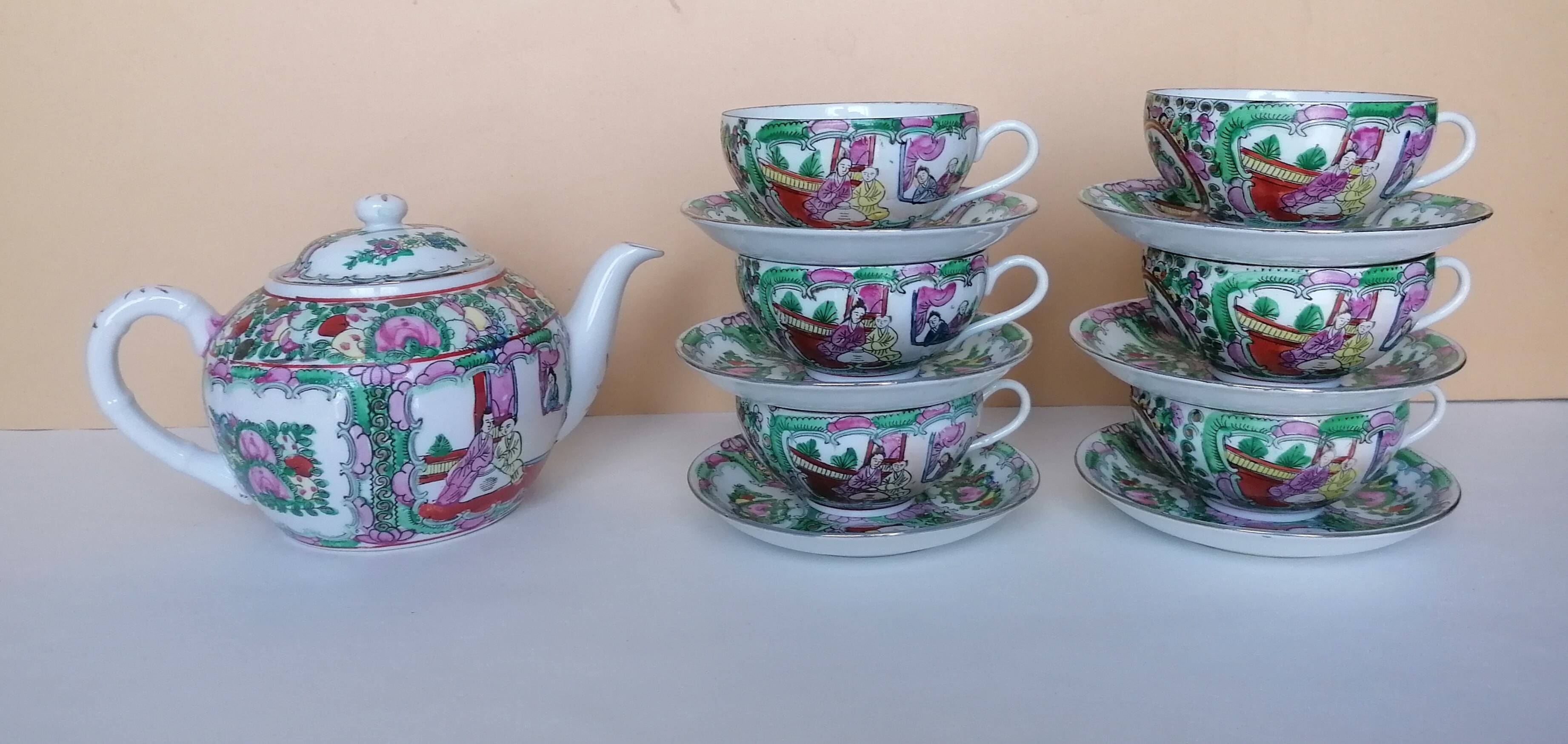 Canton porcelain tea service with 6 cups and teapot.