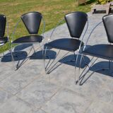 4 chrome and leather chairs designed by Italy