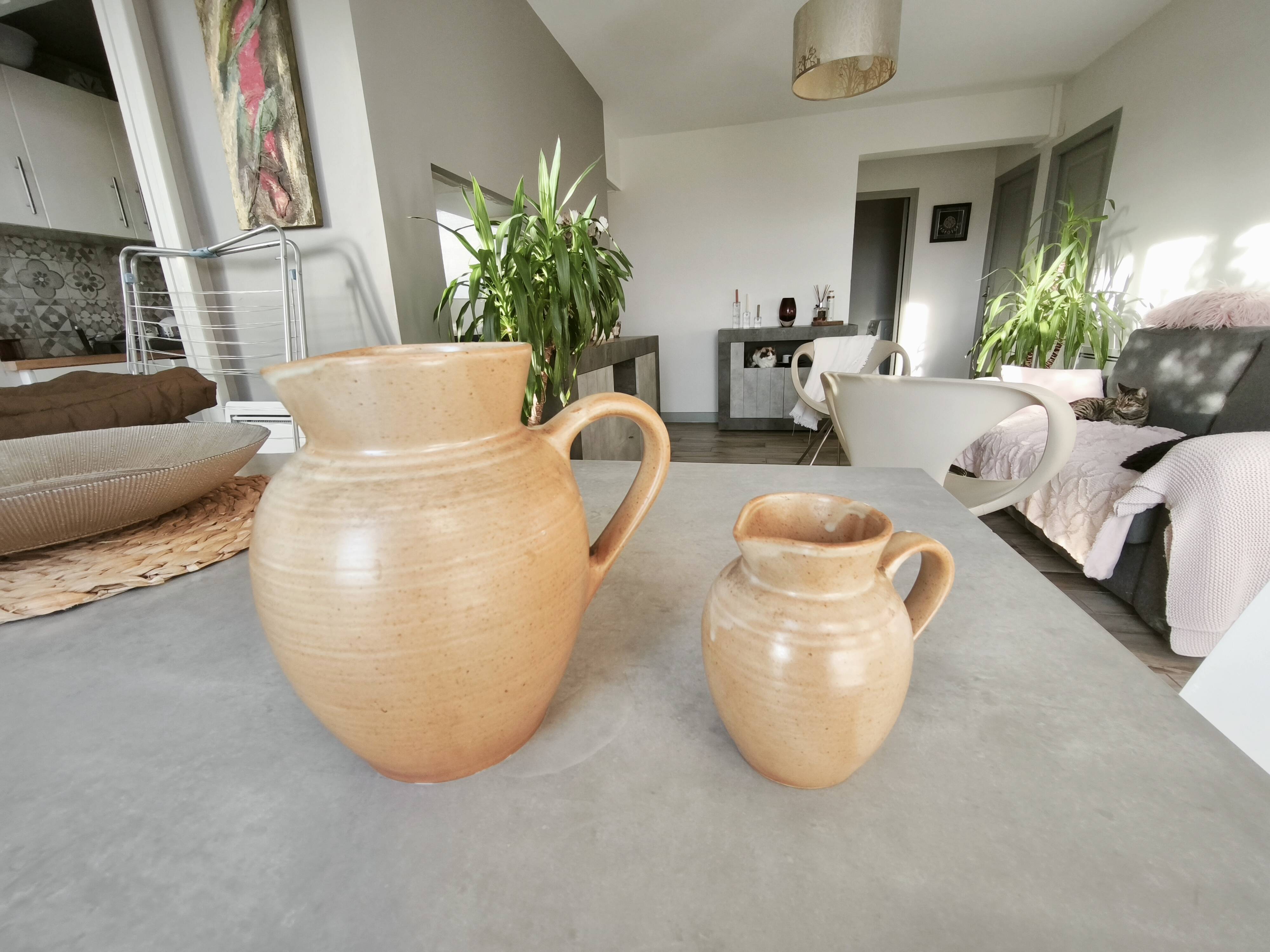 Set of two Village de France stoneware pitchers